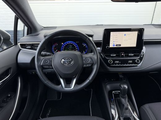 Toyota Corolla Touring Sports 2.0 Hybrid Team D | Trekhaak | CarPlay | ACC | Camera | LED | 17 inch ActivLease financial lease