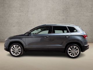 Skoda Karoq 1.0 TSI Sport Automaat (PANORAMADAK, APPLE CARPLAY, GROOT NAVI, CLIMATE, CAMERA, STOELVERWARMING,...