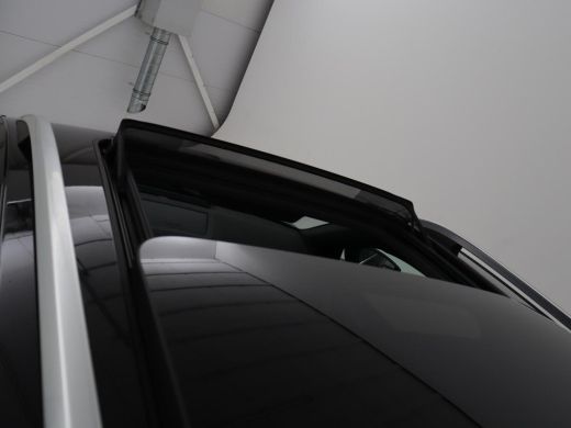 Skoda Karoq 1.5 TSI Business Edition | Panoramadak | Leder | Stoelverwarming | Adaptive cruise | Side Assist ... ActivLease financial lease