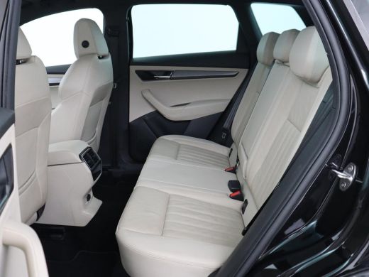 Skoda Karoq 1.5 TSI Business Edition | Panoramadak | Leder | Stoelverwarming | Adaptive cruise | Side Assist ... ActivLease financial lease