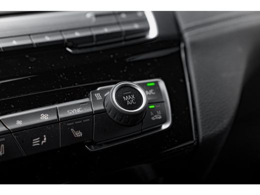 BMW X1 sDrive20i 178 PK Business Edition Plus Head up | Achteruitrijcamera | Cruise control | Keyless | ... ActivLease financial lease