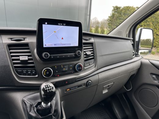 Ford Transit Custom 2.0 TDCI / L1H1 / 1e EIG. / 2.500 KG AHG / CAMERA / TREKHAAK / CRUISE / AIRCO / NAVI / STOELVERW. ActivLease financial lease