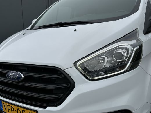 Ford Transit Custom 2.0 TDCI / L1H1 / 1e EIG. / 2.500 KG AHG / CAMERA / TREKHAAK / CRUISE / AIRCO / NAVI / STOELVERW. ActivLease financial lease