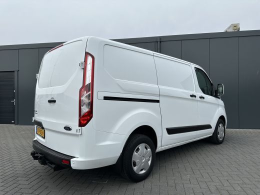 Ford Transit Custom 2.0 TDCI / L1H1 / 1e EIG. / 2.500 KG AHG / CAMERA / TREKHAAK / CRUISE / AIRCO / NAVI / STOELVERW. ActivLease financial lease
