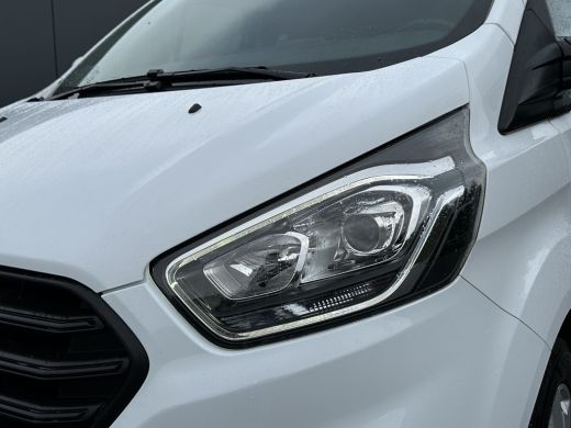 Ford Transit Custom 2.0 TDCI / L2H1 / DUBBEL CABINE / 1e EIG. / TREKHAAK / IMPERIAAL / CAMERA / CRUISE / 6 PERSOONS ActivLease financial lease