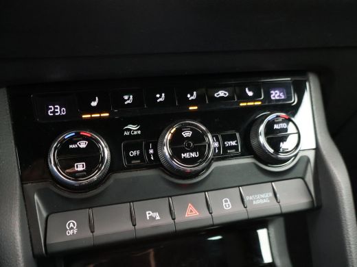 Skoda Karoq 1.5 TSI ACT 150 PK DSG SPORTLINE + CANTON AUDIO | STEEL GREY | CAMERA | 19 INCH | VIRTUAL | SFEER ActivLease financial lease