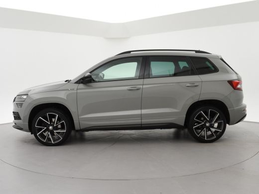 Skoda Karoq 1.5 TSI ACT 150 PK DSG SPORTLINE + CANTON AUDIO | STEEL GREY | CAMERA | 19 INCH | VIRTUAL | SFEER ActivLease financial lease