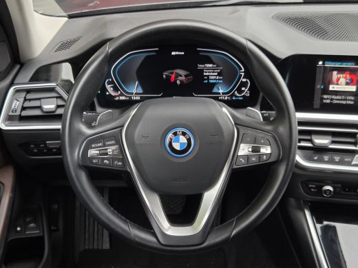 BMW 3 Serie Touring 320e Business Edition Plus | Trekhaak | Panoramadak | Stoelverwarming | Leder ActivLease financial lease