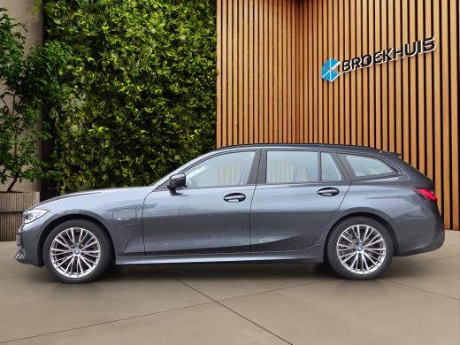 BMW 3 Serie Touring 320e Business Edition Plus | Trekhaak | Panoramadak | Stoelverwarming | Leder ActivLease financial lease