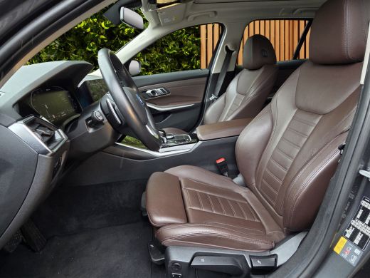 BMW 3 Serie Touring 320e Business Edition Plus | Trekhaak | Panoramadak | Stoelverwarming | Leder ActivLease financial lease