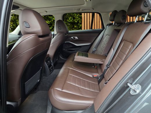 BMW 3 Serie Touring 320e Business Edition Plus | Trekhaak | Panoramadak | Stoelverwarming | Leder ActivLease financial lease