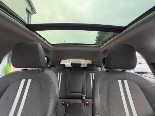 BMW 1 Serie 118i AUT7 M-SPORT HIGH EXECUTIVE PANODAK LEDER NAVI CAMERA DIGI-DASH APPLE-CARPLAY LED LMV PDC ActivLease financial lease