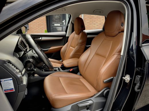 Skoda Karoq 1.5 TSI AUT7/DSG ACT EDITION LEDER NAVI AIRCO PARK-ASSIST APPLE-CARPLAY LED LMV PDC ActivLease financial lease