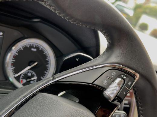 Skoda Karoq 1.5 TSI AUT7/DSG ACT EDITION LEDER NAVI AIRCO PARK-ASSIST APPLE-CARPLAY LED LMV PDC ActivLease financial lease