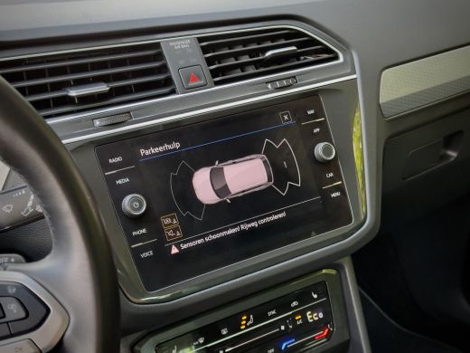 Volkswagen Tiguan 1.4 TSI AUT6 eHYBRID R-LINE VOL-LEDER DIGI-DASH AIRCO IQ-DRIVE PARK-ASSIST LED LMV PDC ActivLease financial lease