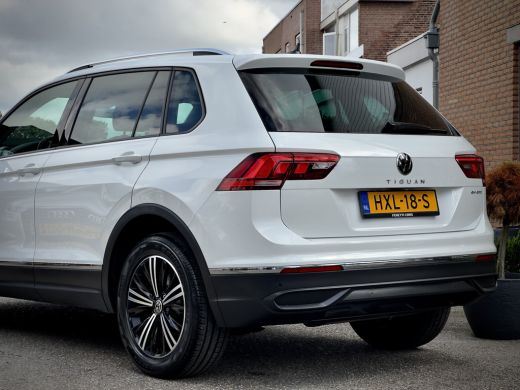 Volkswagen Tiguan 1.4 TSI AUT6 eHYBRID R-LINE VOL-LEDER DIGI-DASH AIRCO IQ-DRIVE PARK-ASSIST LED LMV PDC ActivLease financial lease