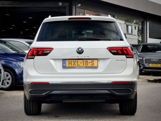 Volkswagen Tiguan 1.4 TSI AUT6 eHYBRID R-LINE VOL-LEDER DIGI-DASH AIRCO IQ-DRIVE PARK-ASSIST LED LMV PDC ActivLease financial lease