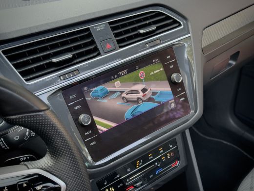 Volkswagen Tiguan 1.5 TSI AUT7 3X R-LINE + NW-MODEL PANODAK NAVI DIGI-DASH PARK-ASSIST LED LMV PDC ActivLease financial lease