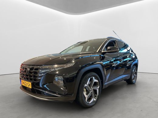 Hyundai Tucson 1.6 T-GDI 265pk PHEV Premium 4WD (299,- p/m Demo Deal!) | Leder | Carplay | Climate | Keyless | N...