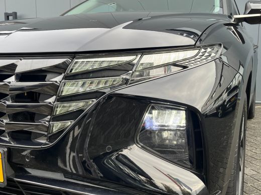 Hyundai Tucson 1.6 T-GDI 265pk PHEV Premium 4WD (299,- p/m Demo Deal!) | Leder | Carplay | Climate | Keyless | N... ActivLease financial lease