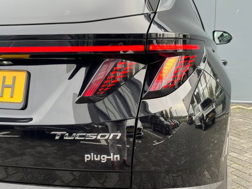 Hyundai Tucson 1.6 T-GDI 265pk PHEV Premium 4WD (299,- p/m Demo Deal!) | Leder | Carplay | Climate | Keyless | N... ActivLease financial lease