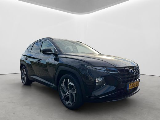 Hyundai Tucson 1.6 T-GDI 265pk PHEV Premium 4WD (299,- p/m Demo Deal!) | Leder | Carplay | Climate | Keyless | N... ActivLease financial lease