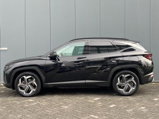 Hyundai Tucson 1.6 T-GDI 265pk PHEV Premium 4WD (299,- p/m Demo Deal!) | Leder | Carplay | Climate | Keyless | N...