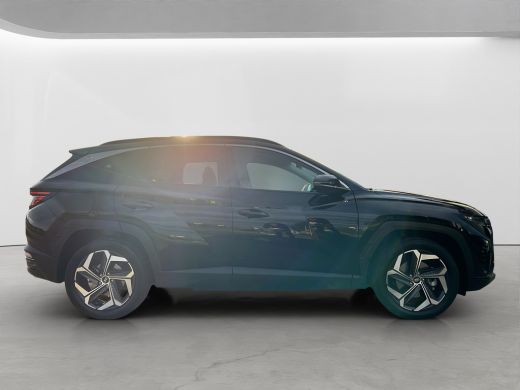 Hyundai Tucson 1.6 T-GDI 265pk PHEV Premium 4WD (299,- p/m Demo Deal!) | Leder | Carplay | Climate | Keyless | N... ActivLease financial lease