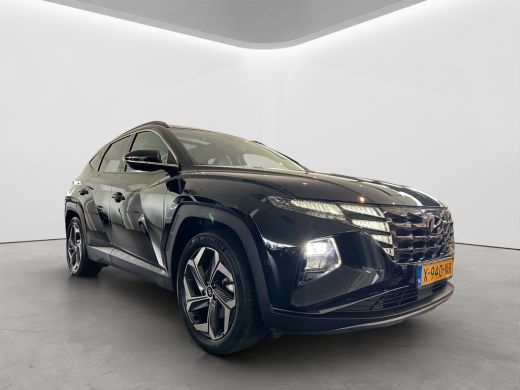 Hyundai Tucson 1.6 T-GDI 265pk PHEV Premium Sky 4WD (299,- p/m Demo Deal!) | Leder | Carplay | Climate | Keyless... ActivLease financial lease