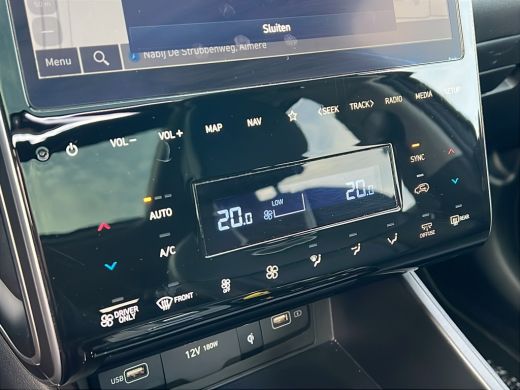 Hyundai Tucson 1.6 T-GDI 265pk PHEV Premium Sky 4WD (299,- p/m Demo Deal!) | Leder | Carplay | Climate | Keyless... ActivLease financial lease