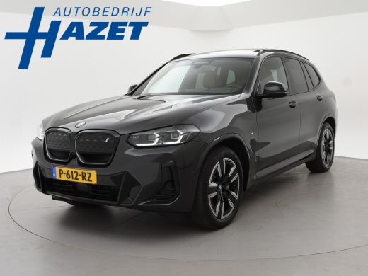 BMW iX3 80 kWh FACELIFT M-SPORT SOH 98,8% + TREKHAAK | SPORTSTOELEN LEDER | PANORAMA | ADAPTIVE CRUISE | ...