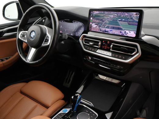 BMW iX3 80 kWh FACELIFT M-SPORT SOH 98,8% + TREKHAAK | SPORTSTOELEN LEDER | PANORAMA | ADAPTIVE CRUISE | ... ActivLease financial lease