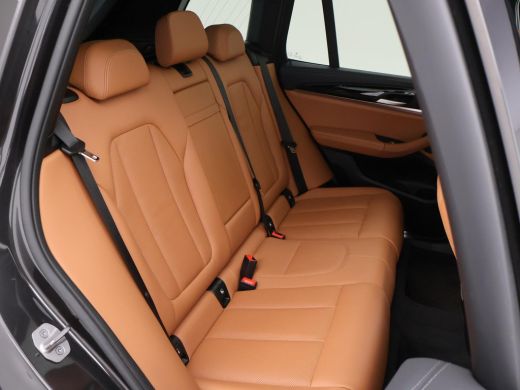 BMW iX3 80 kWh FACELIFT M-SPORT SOH 98,8% + TREKHAAK | SPORTSTOELEN LEDER | PANORAMA | ADAPTIVE CRUISE | ... ActivLease financial lease