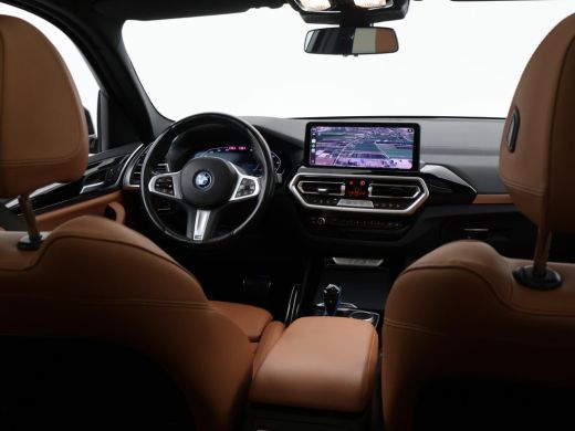 BMW iX3 80 kWh FACELIFT M-SPORT SOH 98,8% + TREKHAAK | SPORTSTOELEN LEDER | PANORAMA | ADAPTIVE CRUISE | ... ActivLease financial lease