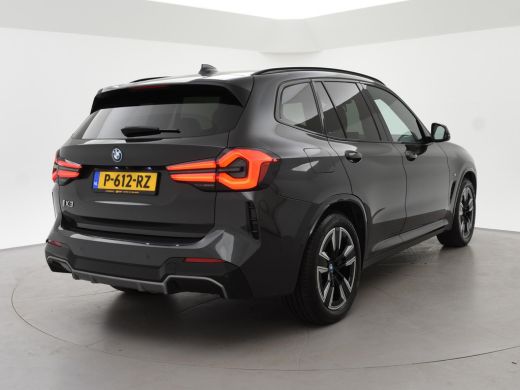 BMW iX3 80 kWh FACELIFT M-SPORT SOH 98,8% + TREKHAAK | SPORTSTOELEN LEDER | PANORAMA | ADAPTIVE CRUISE | ... ActivLease financial lease
