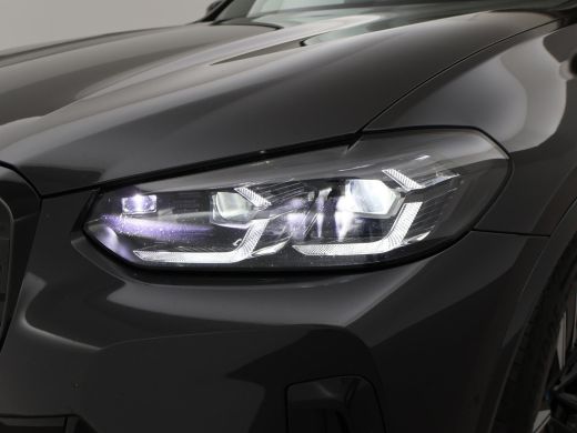BMW iX3 80 kWh FACELIFT M-SPORT SOH 98,8% + TREKHAAK | SPORTSTOELEN LEDER | PANORAMA | ADAPTIVE CRUISE | ... ActivLease financial lease