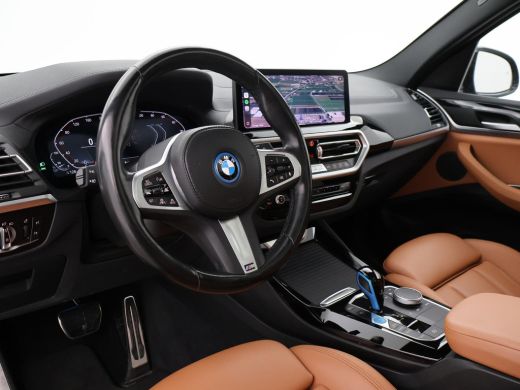 BMW iX3 80 kWh FACELIFT M-SPORT SOH 98,8% + TREKHAAK | SPORTSTOELEN LEDER | PANORAMA | ADAPTIVE CRUISE | ... ActivLease financial lease