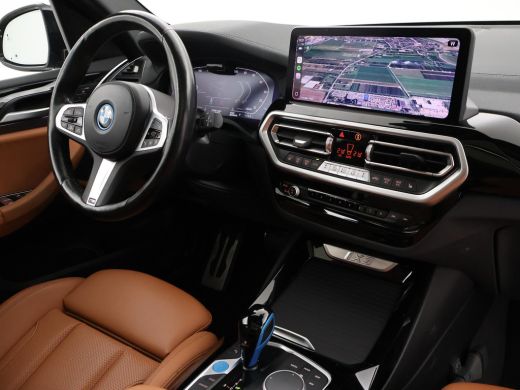 BMW iX3 80 kWh FACELIFT M-SPORT SOH 98,8% + TREKHAAK | SPORTSTOELEN LEDER | PANORAMA | ADAPTIVE CRUISE | ... ActivLease financial lease