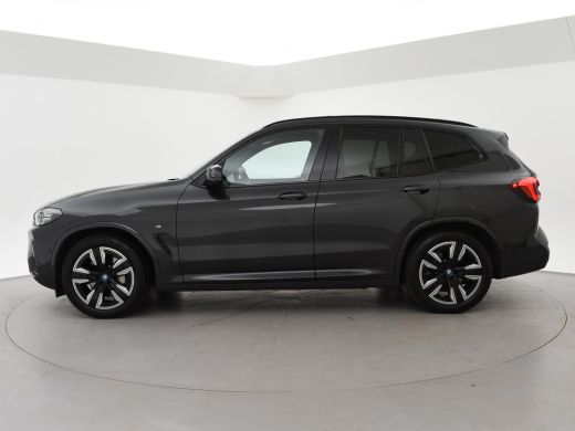 BMW iX3 80 kWh FACELIFT M-SPORT SOH 98,8% + TREKHAAK | SPORTSTOELEN LEDER | PANORAMA | ADAPTIVE CRUISE | ... ActivLease financial lease