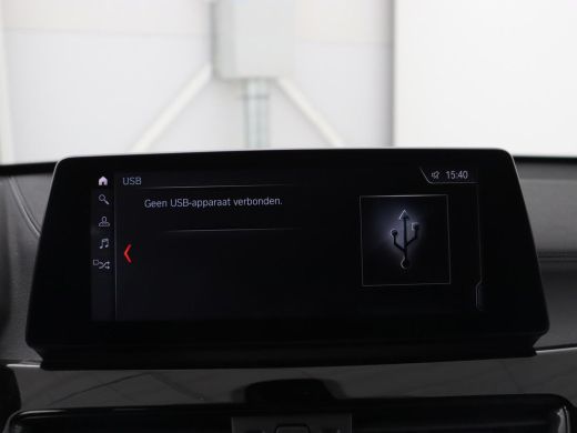 BMW X1 sDrive20i Business Edition Plus | Leder | Head-Up | Stoelverwarming | Trekhaak | Camera | Sfeerve... ActivLease financial lease