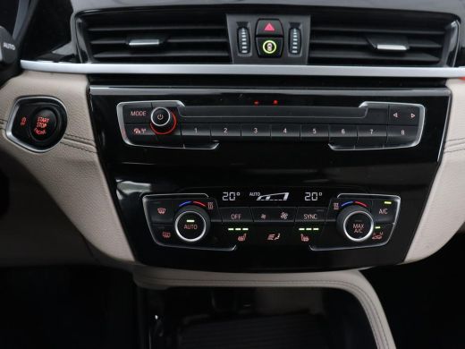 BMW X1 sDrive20i Business Edition Plus | Leder | Head-Up | Stoelverwarming | Trekhaak | Camera | Sfeerve... ActivLease financial lease