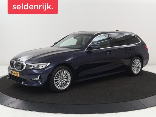 BMW 3 Serie 318i Luxury Line | Sportstoelen | Leder | Carplay | Live Cockpit | Sfeerverlichting | Trekhaak | ...