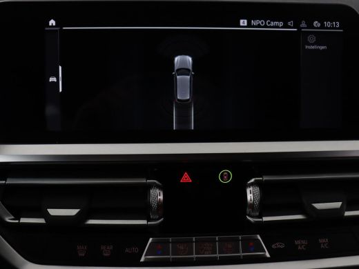 BMW 3 Serie 318i Luxury Line | Sportstoelen | Leder | Carplay | Live Cockpit | Sfeerverlichting | Trekhaak | ... ActivLease financial lease