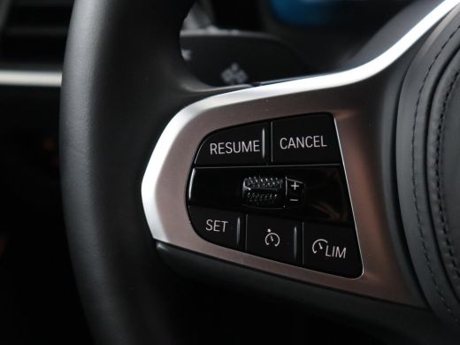 BMW 3 Serie 318i Luxury Line | Sportstoelen | Leder | Carplay | Live Cockpit | Sfeerverlichting | Trekhaak | ... ActivLease financial lease