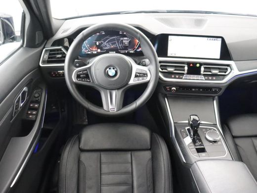BMW 3 Serie 318i Luxury Line | Sportstoelen | Leder | Carplay | Live Cockpit | Sfeerverlichting | Trekhaak | ... ActivLease financial lease