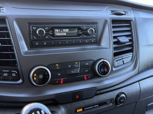 Ford Transit Custom 2.0 TDCI / L2H1 / 1e EIG. / TREKHAAK / IMPERIAAL / AIRCO / CRUISE / LED / STOELVERW ActivLease financial lease