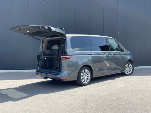 Volkswagen Multivan eHybrid 4MOTION L2 | Bulli | Leder | Glazen Dak | Vis-a-Vis | Houtlook Vloer | 4-Seizoenen Banden ActivLease financial lease