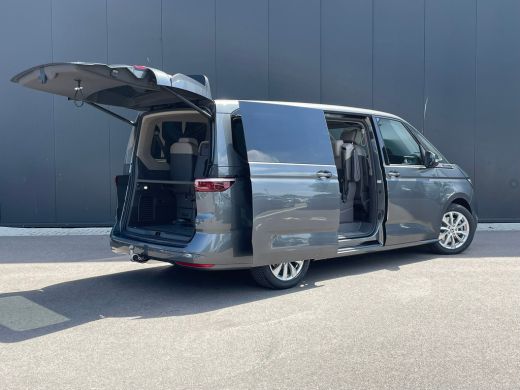 Volkswagen Multivan eHybrid 4MOTION L2 | Bulli | Leder | Glazen Dak | Vis-a-Vis | Houtlook Vloer | 4-Seizoenen Banden ActivLease financial lease