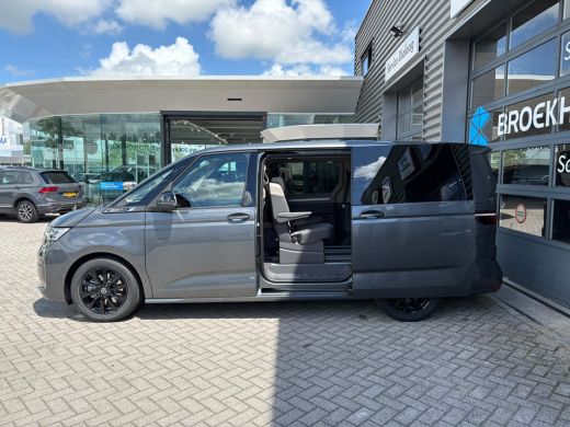 Volkswagen Multivan eHybrid 4MOTION L2 | Bulli | Glazen Dak | Trekhaak | 4 Seizoenen banden | Vis-A-Vis | IQ-Light ActivLease financial lease
