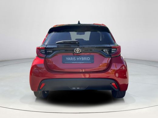 Toyota Yaris 1.5 Hybrid 115 Dynamic | Emotional red parelmoer | Nieuw uit voorraad leverbaar | ActivLease financial lease